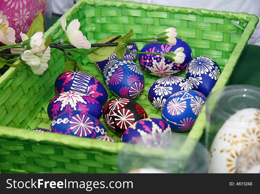 Detail of basket of colored easter eggs. Detail of basket of colored easter eggs