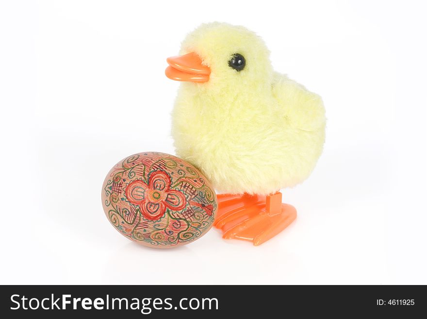 Little yellow chick and egg isolated on white background