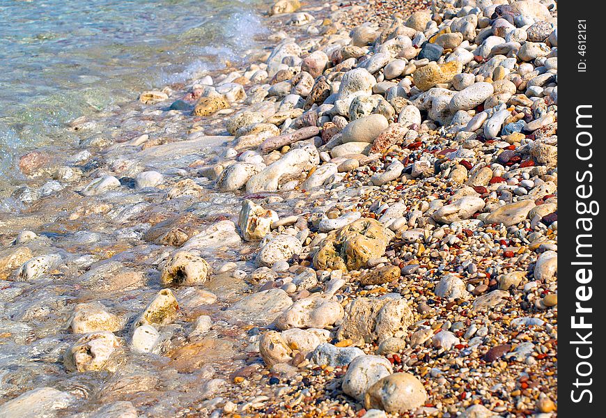 Pebble Stones Washed by the Sea Waters