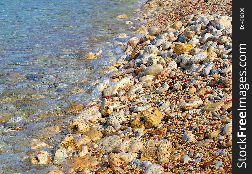 Pebble Stones Washed by the Sea Waters