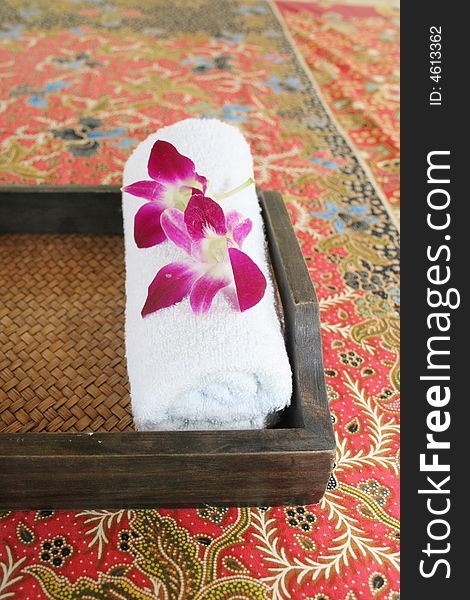 Orchid and a towel at a day spa. Orchid and a towel at a day spa.