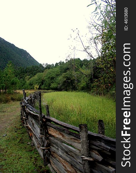 Meadow fense in the mountain valley at tibet in china