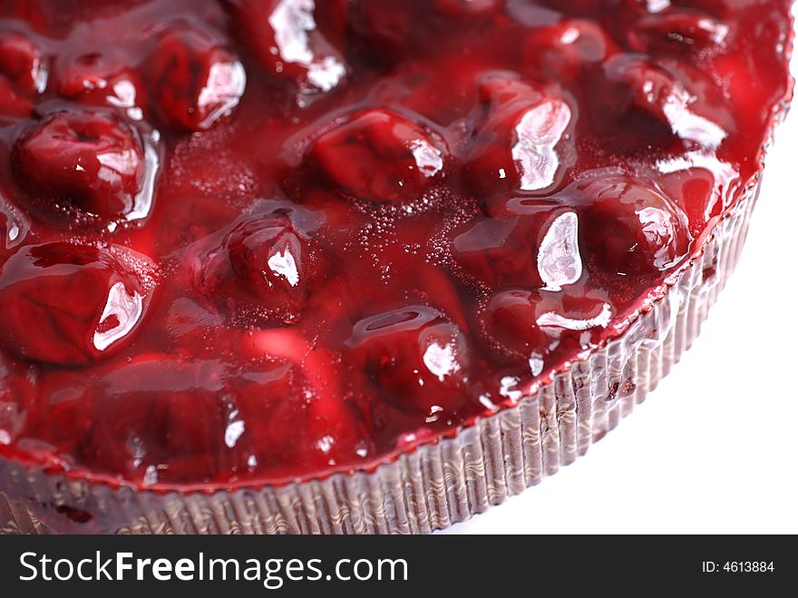 Topping of cherry cake close up.