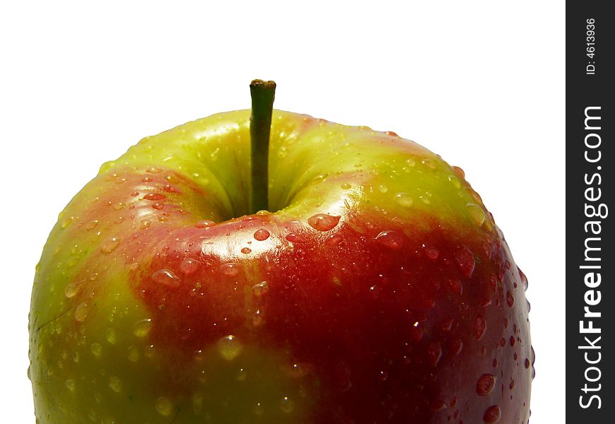 Fresh apple with drops of water on white background