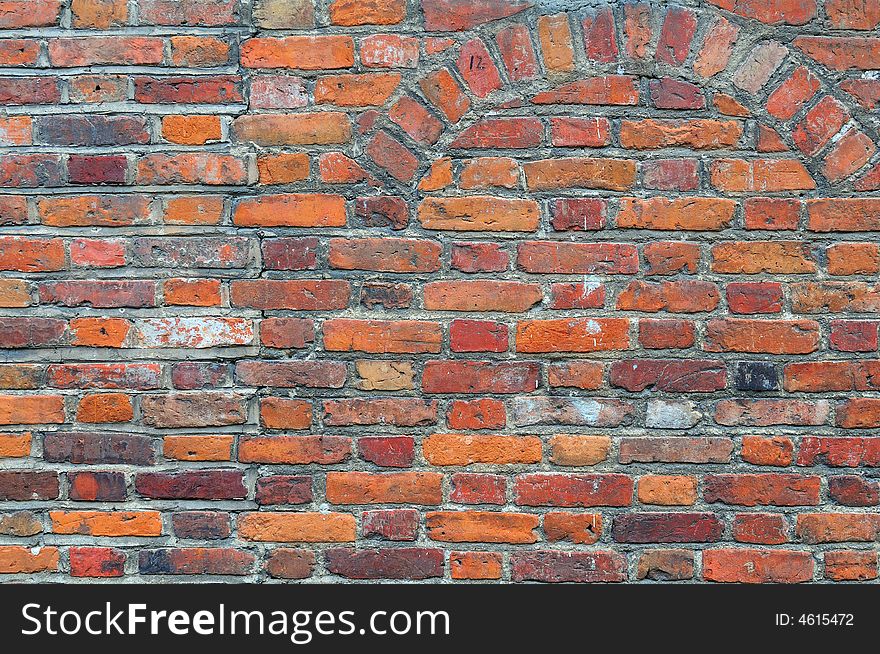 The old Gothic style brick wall