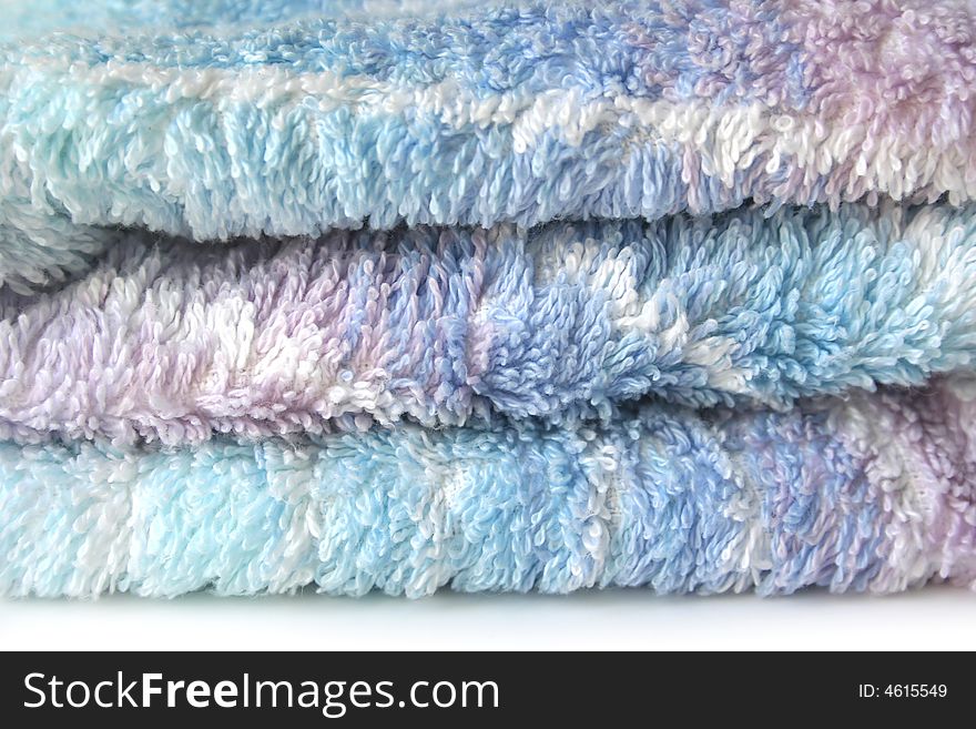 Colorful furry towel on white background. Colorful furry towel on white background