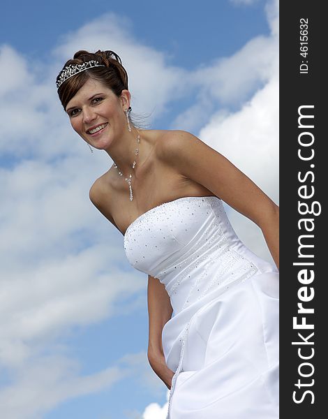 A bride in her white wedding dress. A bride in her white wedding dress