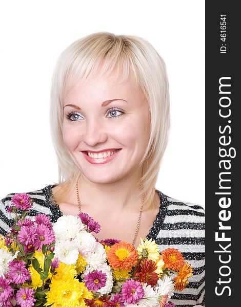 Portrait of the smiling blond girl with flower bouquet. Portrait of the smiling blond girl with flower bouquet