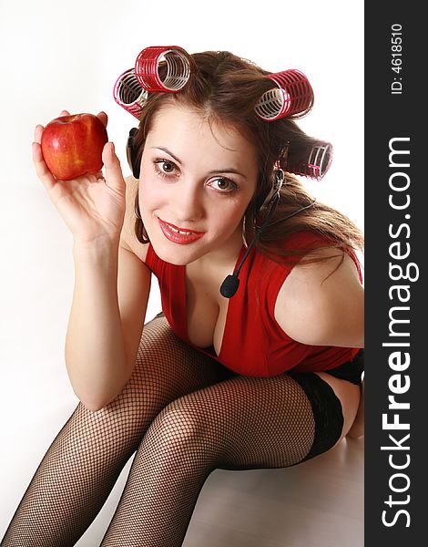 Portrait of the seductive woman with an apple in hands. Portrait of the seductive woman with an apple in hands