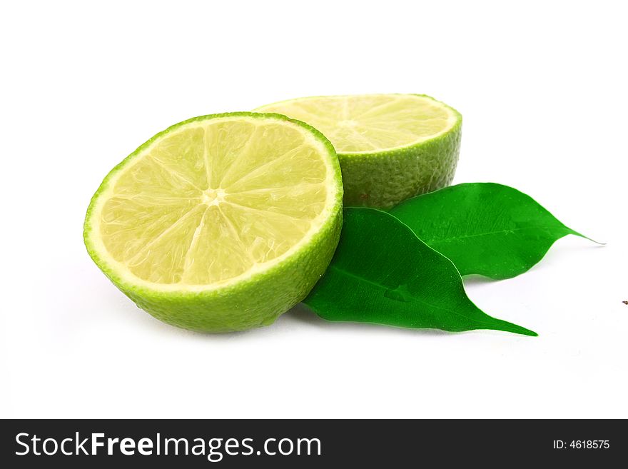 Healthy green lime fruit isolated on white