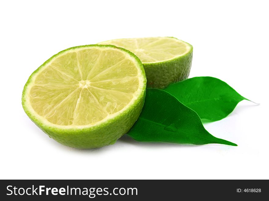 Healthy green lime fruit isolated on white