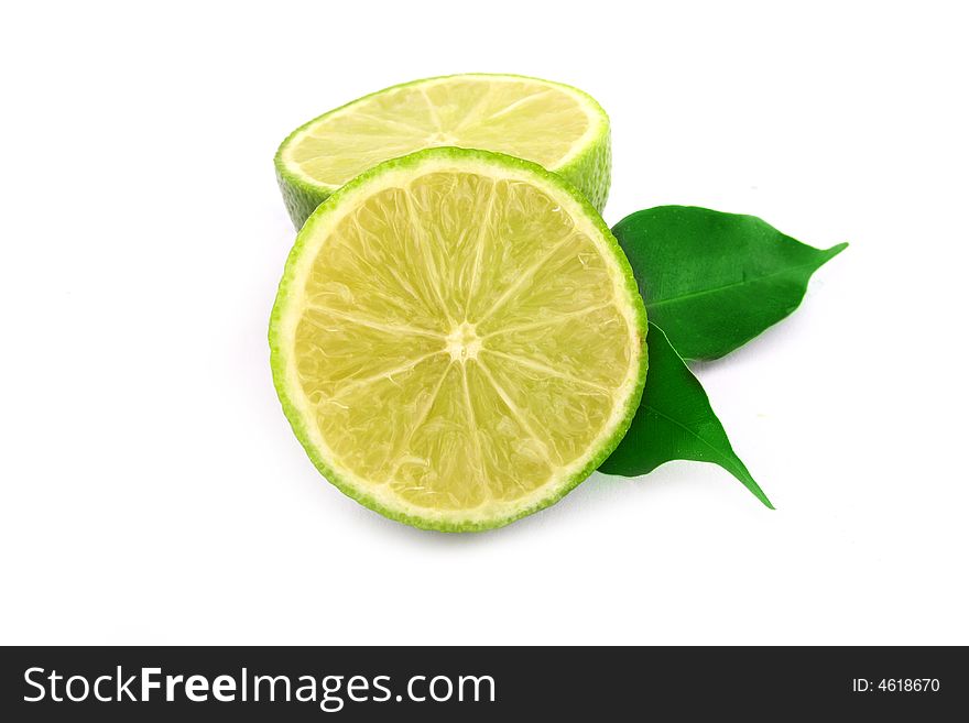 Healthy green lime fruit isolated on white