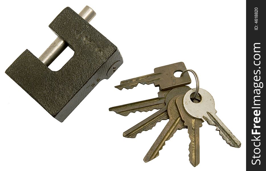 The lock and sheaf of old keys on a white backgrou