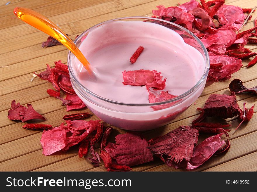 Yogurt and red rose petals