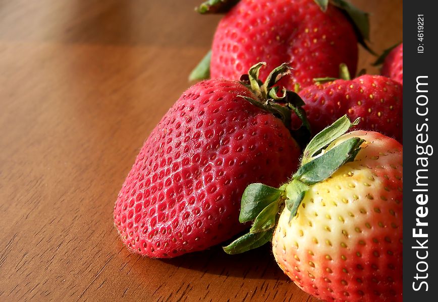 Red Strawberries on Wood