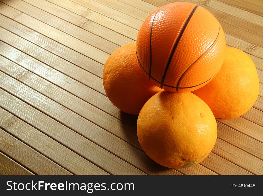 A basketball and orange citrus