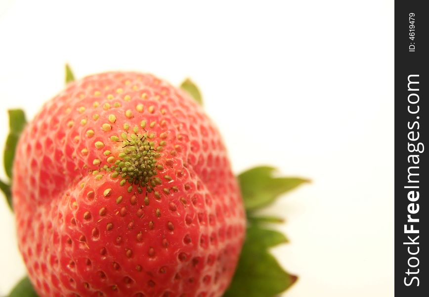 Image of a bright red strawberry, turned upside down, ready for a kiss!  White background and horizontal orientation. Image of a bright red strawberry, turned upside down, ready for a kiss!  White background and horizontal orientation.