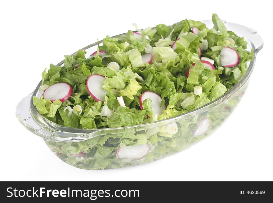 Fresh salad in glass bowl isolated on white background