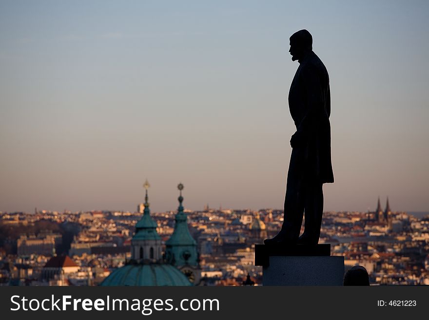 Silhouette of the 1st president (statue) of Czechoslovakia is watching on The Old City of Prague. Silhouette of the 1st president (statue) of Czechoslovakia is watching on The Old City of Prague.