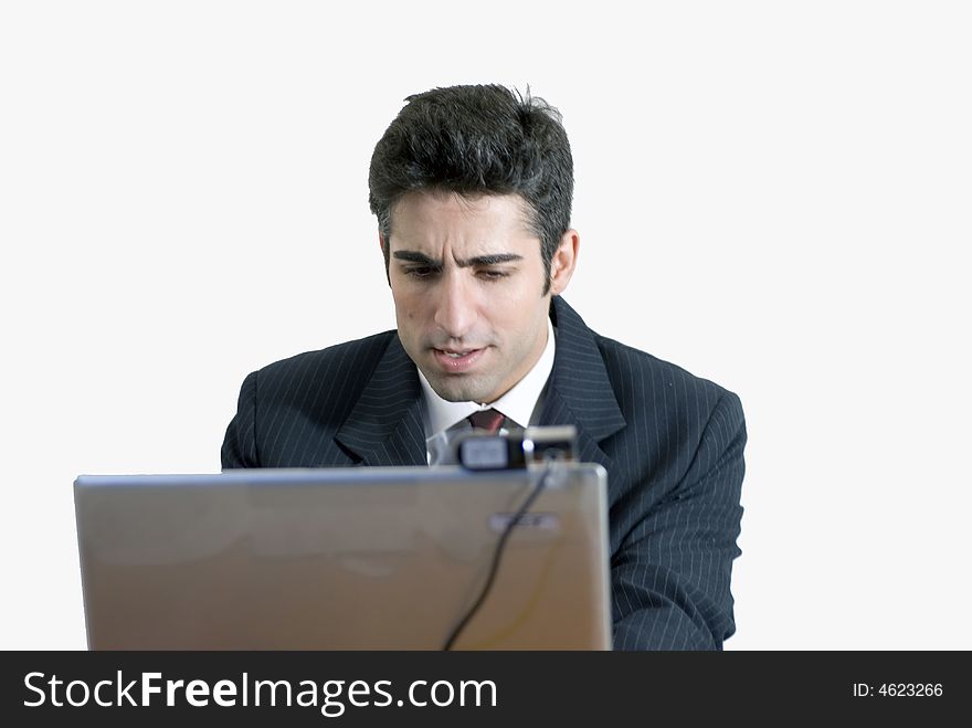 Business man with his forehead crinkled in concentration. Isolated againsts a white background. Business man with his forehead crinkled in concentration. Isolated againsts a white background