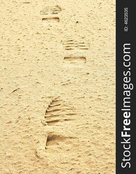 Footprints made by human on beach sand. Footprints made by human on beach sand.