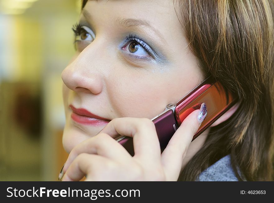 Young woman calling by phone