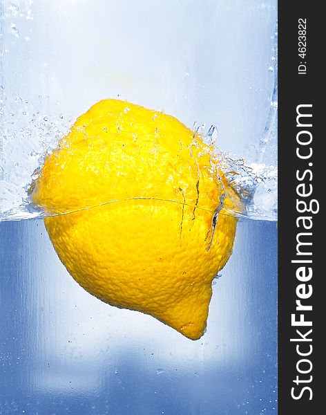 Splashing lemon into a water