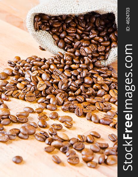 Coffee beans on a wooden board