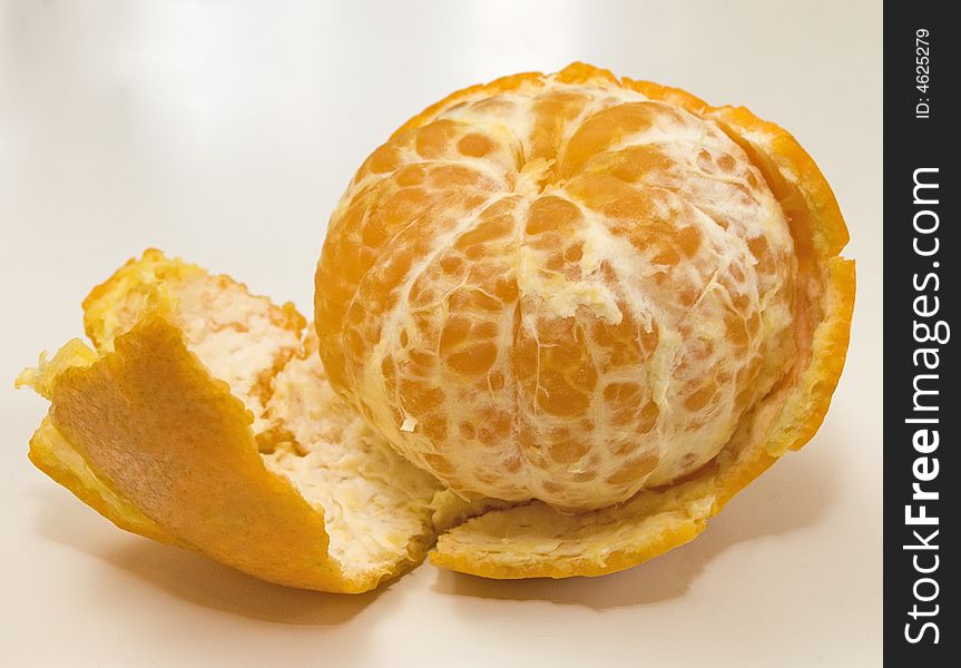 The Whole Ripe Cleared Tangerine With A Peel