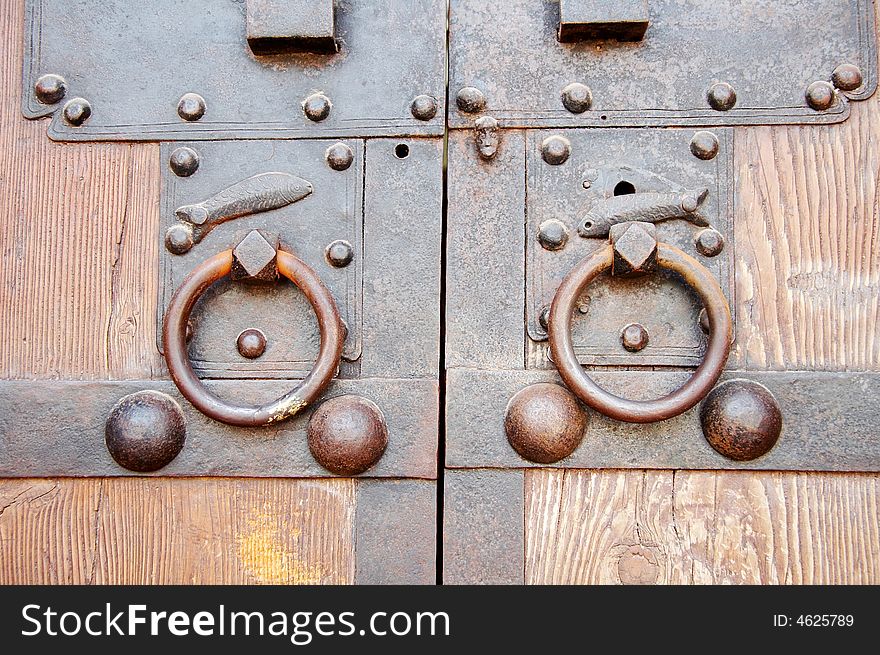 Old Chinese brown door with metal ring. Old Chinese brown door with metal ring