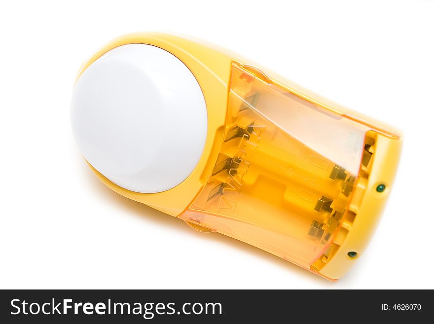 Yellow battery charger over white isolated background