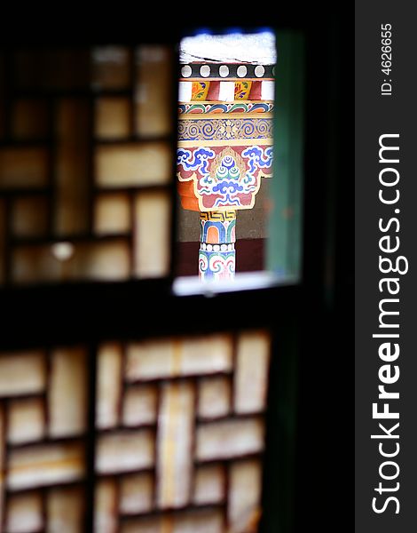 Looking out of the window, in Dege, Tibet. Looking out of the window, in Dege, Tibet