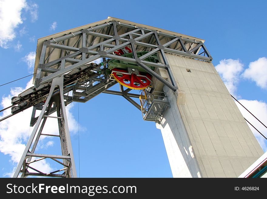 Cableway mechanism with a blue sky in the background