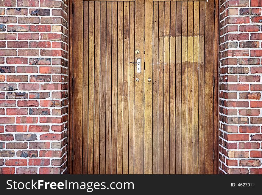 Old timber door in section of wall. Old timber door in section of wall