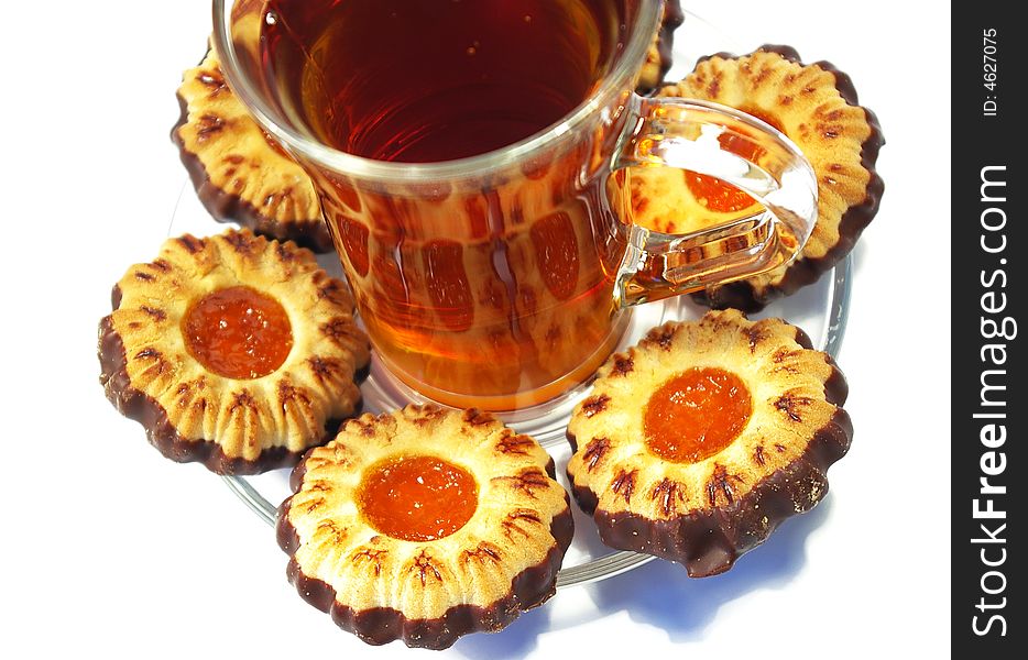 Sweet dessert. Cookies whith jelly and tea on a white background