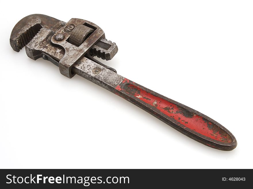 Old Vintage red handled plumbers pipe wrench. Old Vintage red handled plumbers pipe wrench