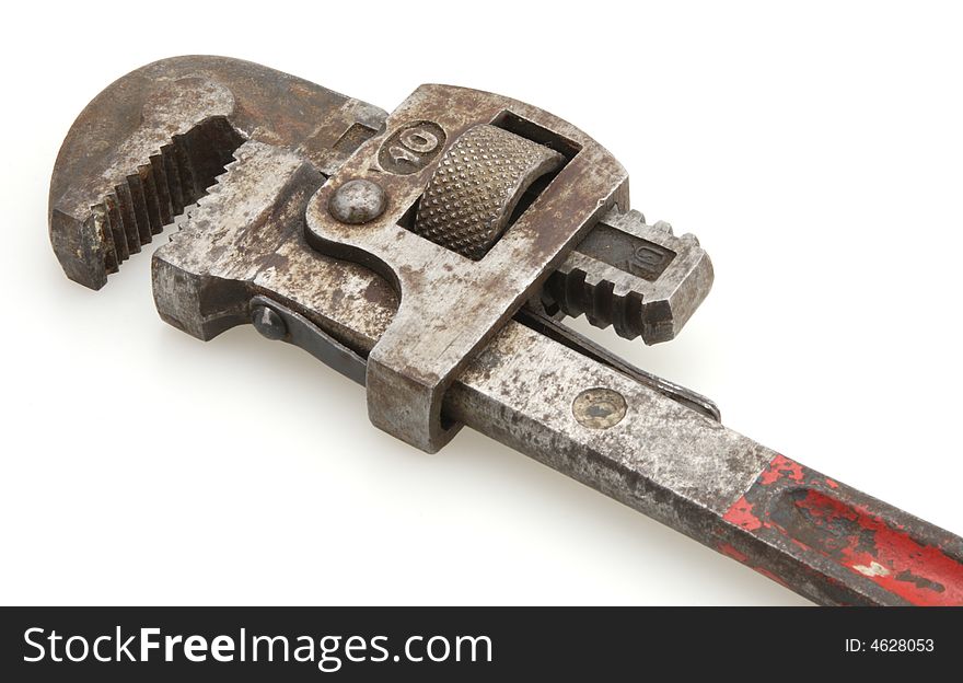 Old Vintage red handled plumbers pipe wrench. Old Vintage red handled plumbers pipe wrench