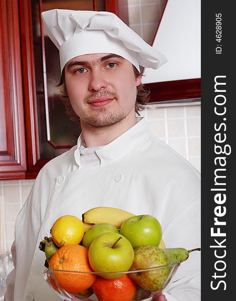 Cook cooking on the kitchen. Cook cooking on the kitchen