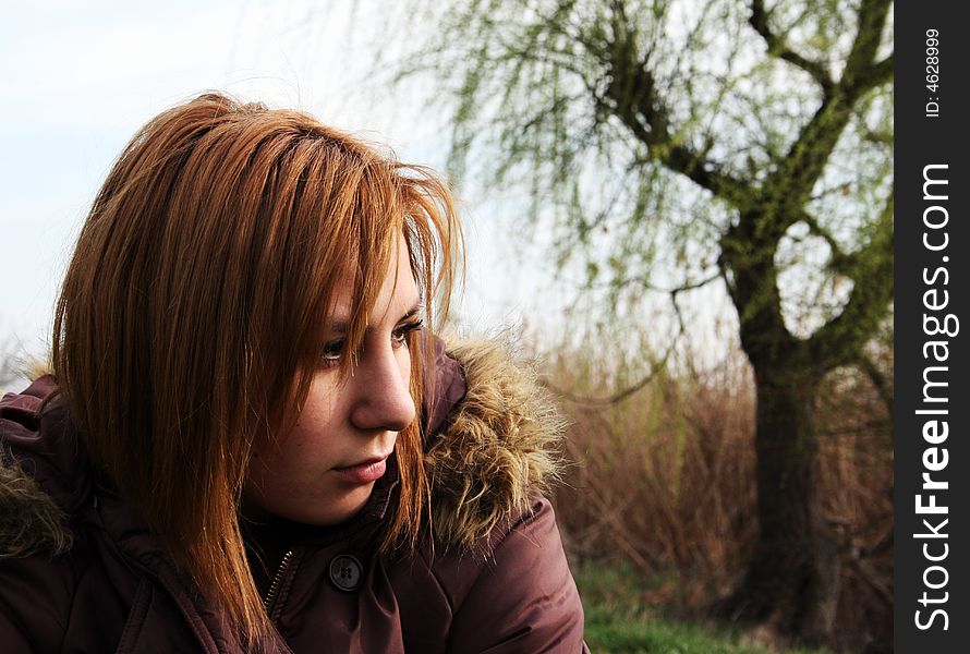 Portrait of a beautiful girl in a park