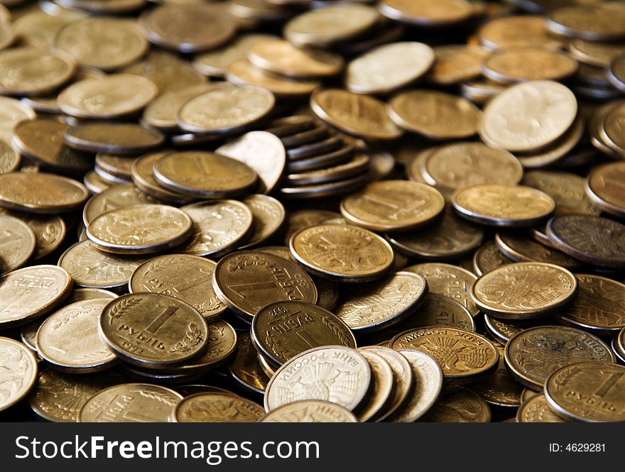 Pile of cooper coins isolated on black