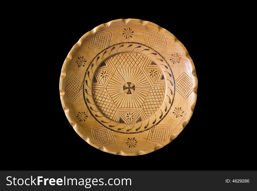 Handicraft wooden dish (isolated on black)