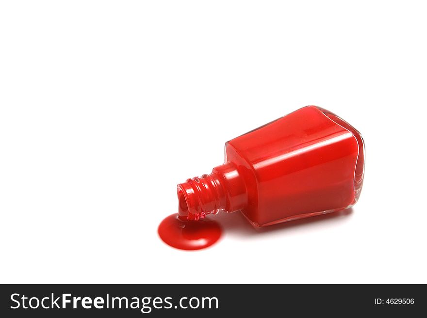 A leaking jar of red nail polish