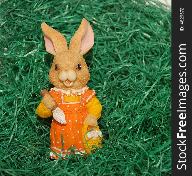 Little ceramic Easter Bunny in the grass