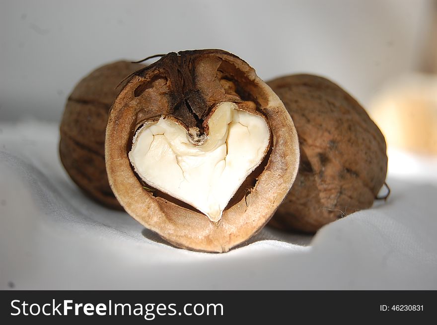 Walnuts background in the shape of heart