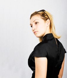 Young Woman In Black Dress Stock Photo