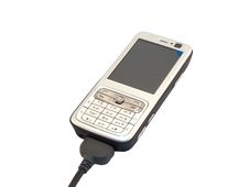 Cell Phone Connected To Usb Royalty Free Stock Images