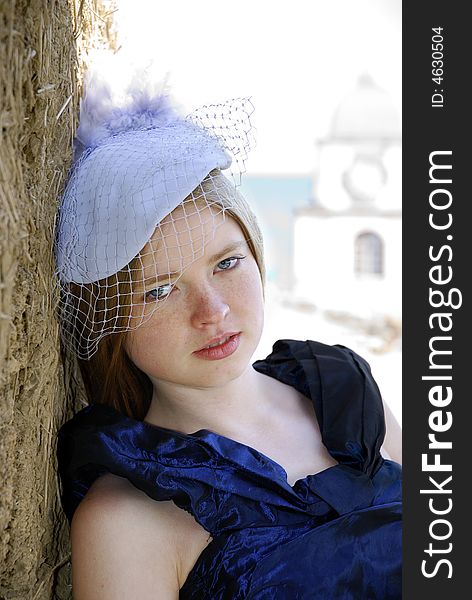 Portrait blonde girl in retro hat