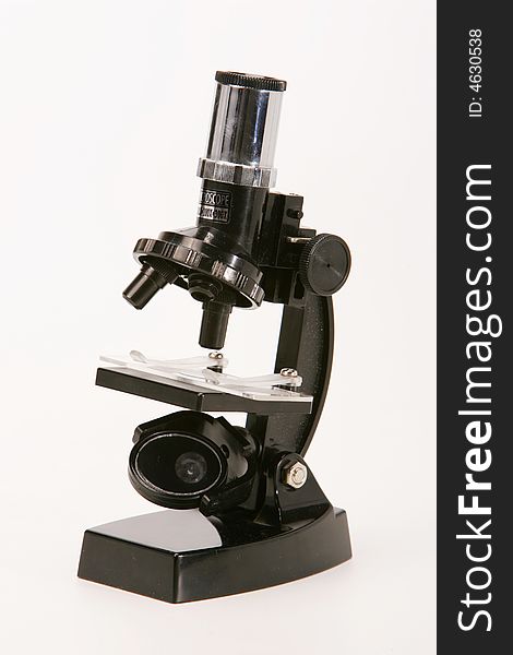 A school microscope on the white background