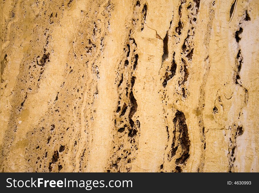 Beige stone wall texture with big gaps