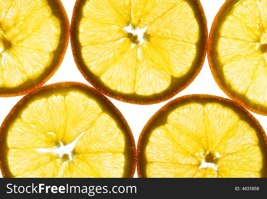 Slice of an orange isolated on white